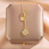 Women's Elegant Flower Shape Titanium Steel And Copper Inlaid With Zircon Clover Tassel Necklace With Color Retention Enhancement
