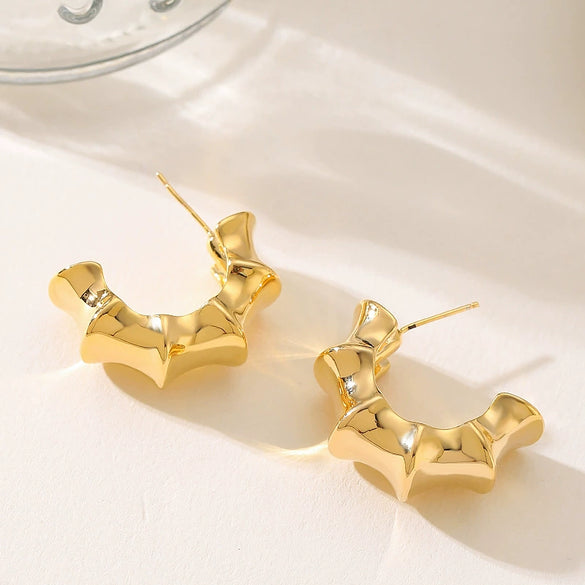 Women's Exaggerated Geometric Letter Earrings In Goldplated Metal With A Bambooinspired Cshaped Minimalist Design