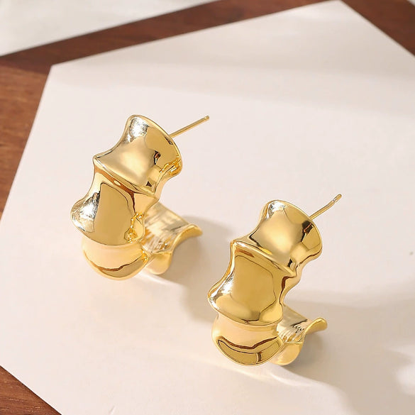 Women's Exaggerated Geometric Letter Earrings In Goldplated Metal With A Bambooinspired Cshaped Minimalist Design