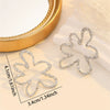 Women's Exaggerated Hollow Floral Earrings In Electroplated Zinc Alloy With A Simple Elegant Design
