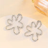 Women's Exaggerated Hollow Floral Earrings In Electroplated Zinc Alloy With A Simple Elegant Design