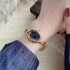 Women's Fashion Alloy Bracelet Watch With Cut Out Design And Roman Numerals