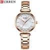 Women's Fashion Alloy Shell Round Dial Quartz Casual Waterproof Watch With Rhinestones