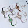Women's Fashion Heartshaped Alloy Bracelet Watch With Diamondencrusted And Printed Logo
