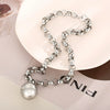 Women's Fashion Jewelry Twopiece Set With Titanium Steel And Pearl Chain And Large Ball Design