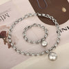 Women's Fashion Jewelry Twopiece Set With Titanium Steel And Pearl Chain And Large Ball Design