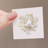 Women's Fashion Light Luxury Alloy Imitation Pearl Flower Bow Hollow Brooch With Electroplating