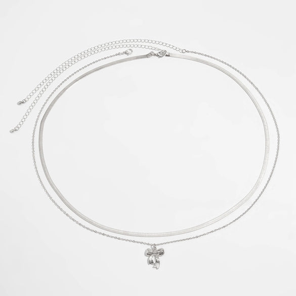 Women's Fashion Metal Waist Chain With Bow Pendant And Snake Bone Design Made Of Copper Chain Alloy