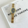 Women's Fashion Retro Oval Metal Case Fine Steel Strap Quartz Watch
