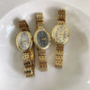 Women's Fashion Retro Oval Metal Case Fine Steel Strap Quartz Watch