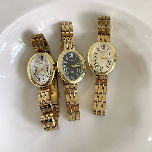 Women's Fashion Retro Oval Metal Case Fine Steel Strap Quartz Watch