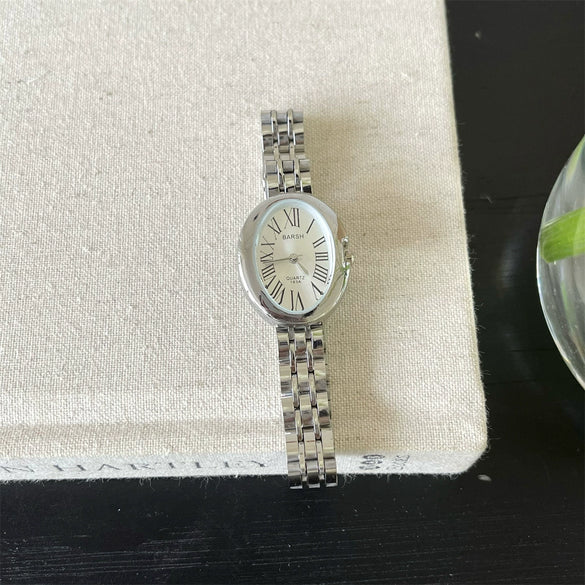 Women's Fashion Retro Oval Metal Case Fine Steel Strap Quartz Watch