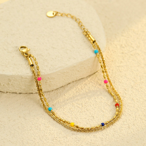Women's Fashion Stainless Steel And 18K Gold Stacked Bracelets With Colorful Rice Beads And Electroplating Treatment