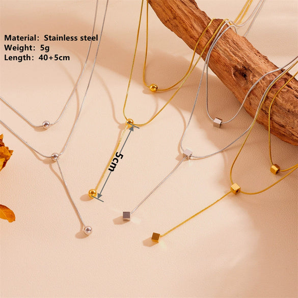 Women's Fashion Stainless Steel And Titanium Steel Neck Chain With Geometric Pattern Steel Ball And Square Tassel Design