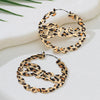 Women's Fashionable Electroplated Alloy Hollow Geometric Circle Letter And Flower Earrings