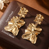 Women's Geometric Asymmetrical Pleated Statement Earrings With Electroplated Iron Design And Stainless Steel Posts
