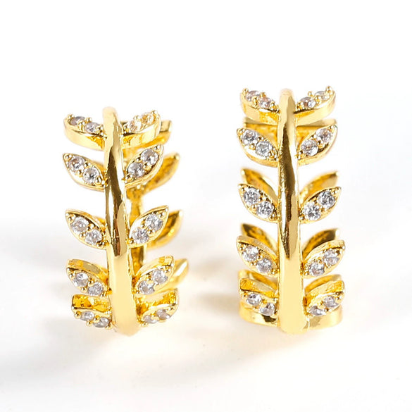 Women's Geometric Diamond Earrings In Electroplated Alloy With A Curved Statement Design For Fashion Jewelry Collections