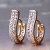 Women's Geometric Diamond Earrings In Electroplated Alloy With A Curved Statement Design For Fashion Jewelry Collections