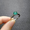 Women's Geometric Green Crystal Ring In Environmentally Friendly Copper With White Gold Electroplated Finish And Six Prong Setting