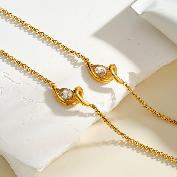 Women’s Geometric Irregular Zircon Inlaid Stainless Steel Necklace And Bracelet Set With 18K Vacuum Plated Finish