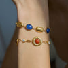 Women's Geometric Stainless Steel Bracelet With Colored Resin Beads And Gold Tone Plated Finish