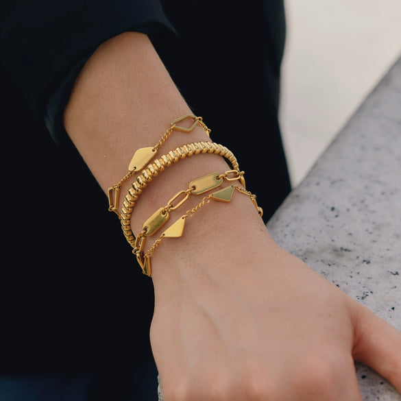 Women's Geometric Stainless Steel Bracelet With Polished Plated Finish And Hypoallergenic Metal Design