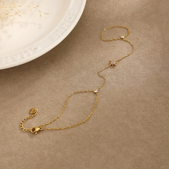 Women's Geometric Star Hand Chain Bracelet In Gold Plated Stainless Steel With A Delicate Thin Chain Design