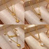 Women's Gold Plated Titanium Steel Double Layer Pendant Necklace With Faux Pearl Moon Sun Heart And Zircon Geometric Charms