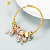 Women's Gold Tone Butterfly Multi Element Pendant Bracelet In Alloy With Electroplated Finish