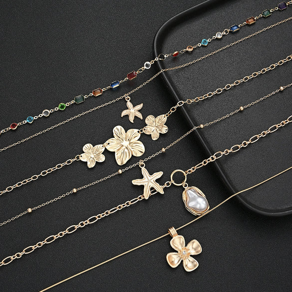 Women's Goldtone Alloy Flower And Star Pendant Necklace With Irregular Tassel Chain Electroplated Layered Design Wholesale
