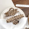 Women's Handmade Beige Leopard Print Shark Hair Clip With Bowknot And Simple Geometric Style