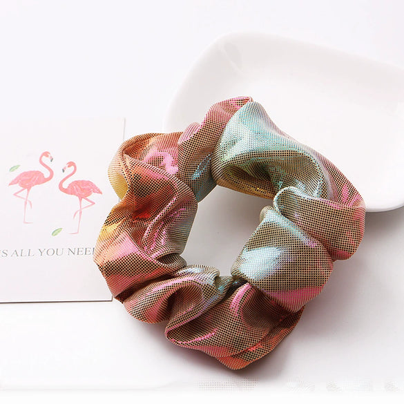 Women's Handmade Fabric Scrunchie Hair Tie With Metallic Rainbow Gradient Foil Finish And Oversized Flower Detail