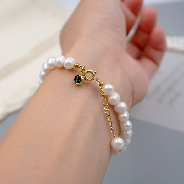 Women's Handmade Freshwater Pearl Beaded Bracelet With Geometric Design And Small Pendant