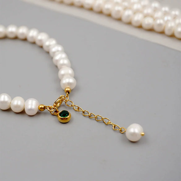 Women's Handmade Freshwater Pearl Beaded Bracelet With Geometric Design And Small Pendant