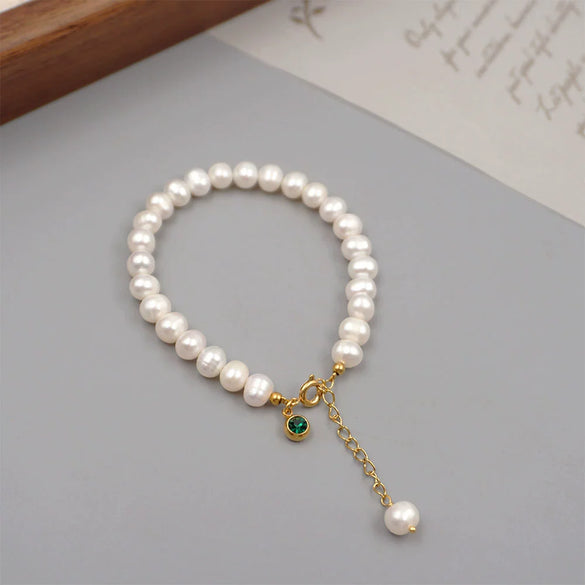 Women's Handmade Freshwater Pearl Beaded Bracelet With Geometric Design And Small Pendant