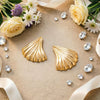 Women's Hollow Ginkgo Leaf Earrings With Electroplated Zinc Alloy Design And Steel Ear Needles Highend Botanical Jewelry