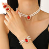Women's Imitation Pearl Jewelry Threepiece Set With Heart Water Drop Bell Patterns And Alloy Pendants Set With Diamonds