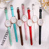 Women's Leisure Alloy Case Quartz Watch With Imitation Leather Strap And Stainless Steel Clasp Round Dial