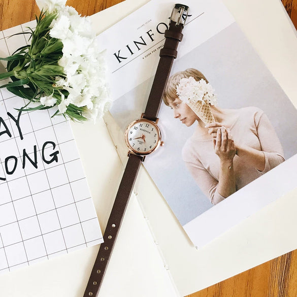 Women's Leisure Vintage Artistic Alloy Case Imitation Leather Strap Round Dial Watch