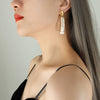 Women's Light Luxury Geometric 316L Stainless Steel Oval Freshwater Pearl Tassel Earrings Electroplated Jewelry