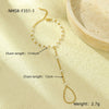 Women's Light Luxury Style Stainless Steel And 18K Gold Hand Jewelry With Pearl Bracelet And Finger Chain Integrated