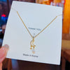 Women's Light Luxury Titanium Steel And Copper Moon Star Pendant Tassel Clavicle Necklace With Geometric Pattern And Cross Chain