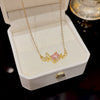 Women's Light Luxury Titanium Steel Necklace With Geometric Pattern And Inlaid Zircon Pendant On Cross Chain