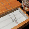 Women's Light Luxury Titanium Steel Necklace With Geometric Pattern And Inlaid Zircon Pendant On Cross Chain