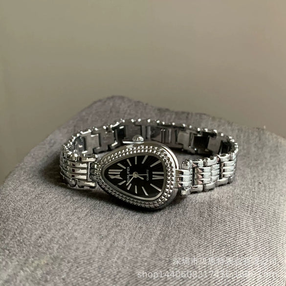 Women's Luxury Alloy Case Snake Chain Watch With Ordinary Glass Mirror And Special Shape Dial