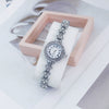 Women's Luxury Round Alloy Bracelet Watch With Rhinestones And Roman Numerals
