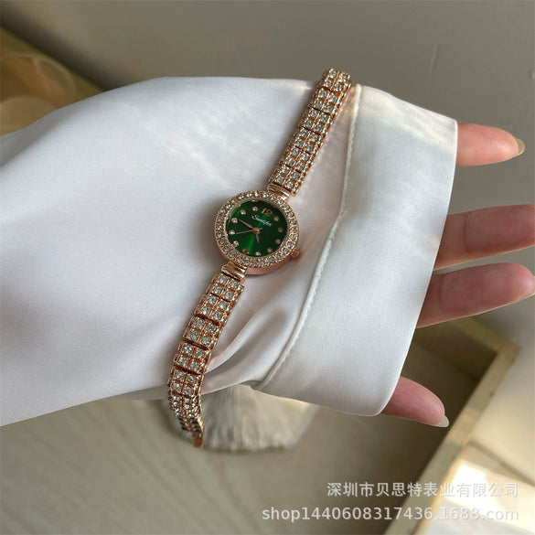Women's Metal Alloy Round Dial Diamond Bracelet Watch Fashionable Style