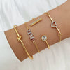 Women's Metal Bracelet With Diamond And Heart Shaped Design