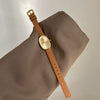 Women's Metal Case Genuine Leather Strap Oval Quartz Watch With Simple Temperament And Light Luxury Design