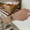 Women's Metal Case Ordinary Glass Mirror Oval Dial Retro Artistic Golden Steel Strap Watch
